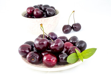 Fresh cherries on a white background