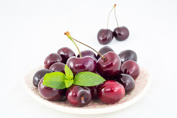 Fresh cherries on a white background