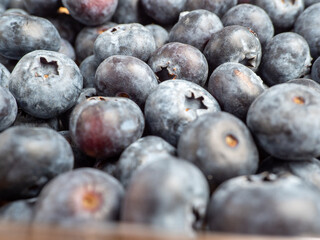 Blueberries in a wooden bowl.