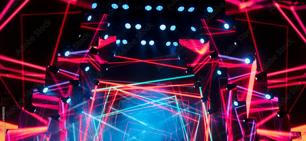 Wall mural stage lighting in the theater and at the concert. Lighting equipment on an empty stage.