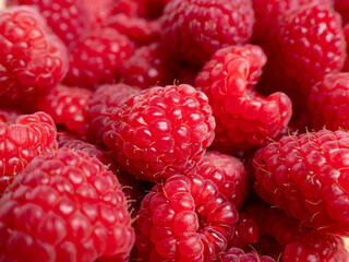 Raspberries in a wooden bowl.
