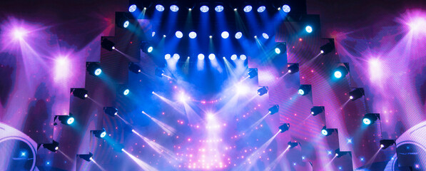 stage lighting in the theater and at the concert. Lighting equipment on an empty stage.