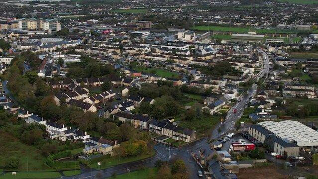 Tralee Town, Ireland. Aerial View of Buildings and Streets in Green Landscape on Autumn Season, Establishing Drone Shot
