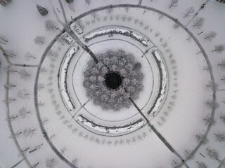 aerial top view of the architectural element of the crater in the regular recreation park in the...