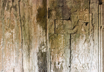 Mythological storytelling carved into the walls of Angkor Wat