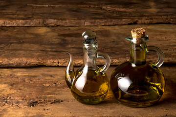 Olive oil extra quality first cold pressed rustic background.