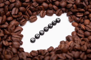 Roasted robusta coffee beans with inscription. Alternative coffee.