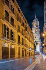Night view streets and the cathedral in Malaga, Spain. Beautiful cityscape of the sightseeing spots of the city