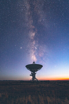 Very Large Array satellite dish under the Milky Way in New Mexico