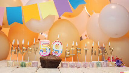 Happy birthday greetings for 59 years from gold letters of candles burning against the background...