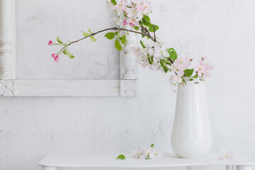 beautiful spring flowers on background white wall