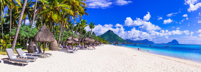 Best tropical beaches. beautiful Flic en Flac beach with white sand in Mauritius island. - obrazy, fototapety, plakaty