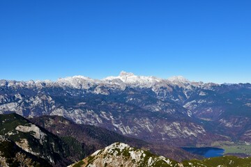 Naklejka na ściany i meble Scenic view of Triglav mountain in Julian alps and Triglav national park, Slovenia with Bohinj lake visible bellow