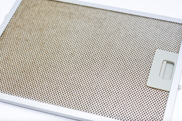 Dirty and clogged with grease and dirt filter. Extractor kitchen ventilation.