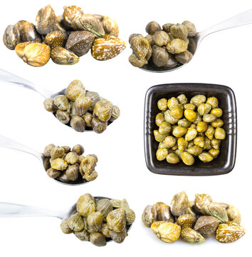 top view of pickled capers in black bowl isolated