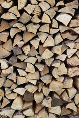 Fototapeta premium Stack of firewood full frame
