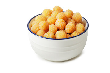 composition of ripe raspberries in a bowl on a textured background