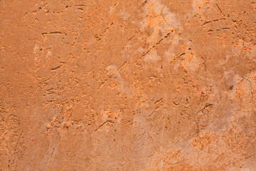 Aged orange pastel wall plaster with stripes. Background picture. Panted Concrete surface. Wallpaper textured picture. top view. 