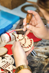 Process making handmade wooden Christmas toys in carpentry woodworking workshop. Eco friendly...