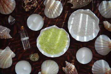 Skin care. Set for spa. Sea salt, white clay, essential oil top view. Green sea salt with olive...