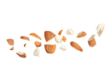 Pieces of tasty almonds on white background