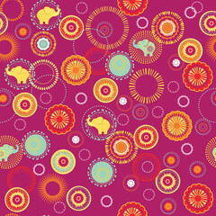 A happy and colorful pattern in a warm color pallet. A modern twist on traditional Indian motifs. Seamless vector patterns are great for backgrounds and surface designs.