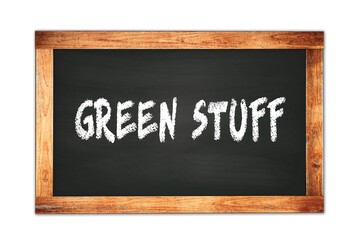 Fototapeta premium GREEN STUFF text written on wooden frame school blackboard.