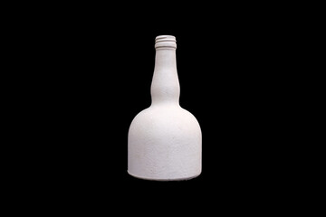 white bottle of gypsum isolated on a black background