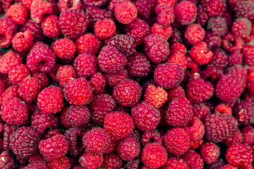 Raspberry. Ripe sweet raspberry background. Close up image.