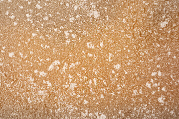 Selective focus of surface of salt in the salt field in natural daylight from Thailand.