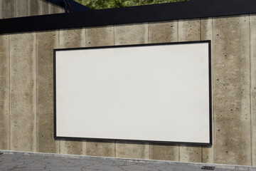 Blank Poster frame / Billboard / Display on an old factory concrete stone wall - Mockup 