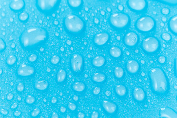 Water drops bubble texture, abstract blue background, close-up, macro. Selective focus