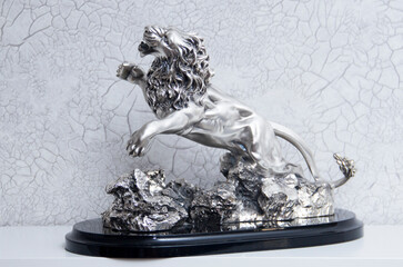 Silver lion statuette. A souvenir made of silver. A premium gift.