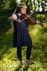 Young girl playing the viola