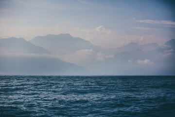 Fototapeta premium Mountain view with sea and clouds