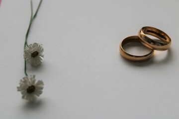 wedding rings and a bouquet