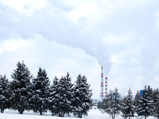 Industrial area of the city in winter, heat production