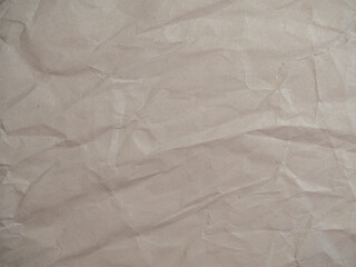 Obraz premium Crumpled wrinkled wrapping paper with abstract texture. Empty blank