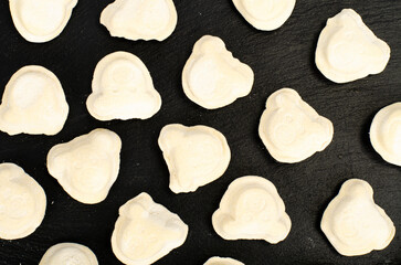 Raw dumplings with organic meat for baby food. Studio Photo