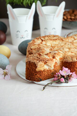 Colomba - traditional italian easter dove cake with glaze, macaranage, almonds