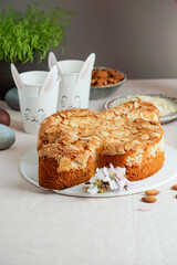 Colomba - traditional italian easter dove cake with glaze, macaranage, almonds
