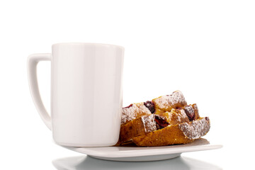 Three slices of homemade cottage cheese casserole with cherries on a white ceramic saucer with a white ceramic cup, macro, isolated on a white background.

