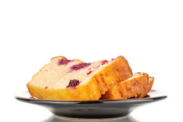 Three slices of homemade cottage cheese casserole with cherries on a ceramic saucer, macros, isolated on a white background.

