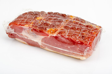 Piece of raw smoked pork ham on white background. Studio Photo