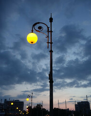 A streetlight at summer twilight