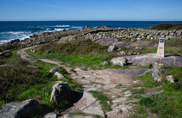 Signpost of the Portuguese Way of Saint James along the coast in A Guarda