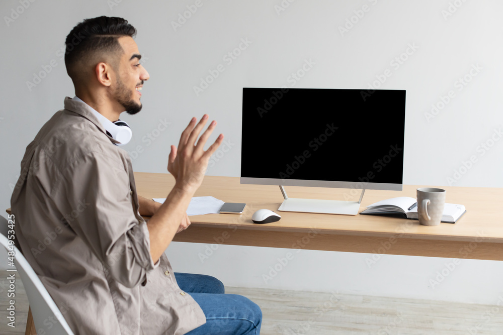Aufkleber arab man waving hand at blank empty computer monitor