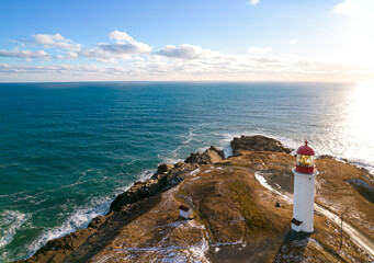 Sunny day at the lighthouse by the sea