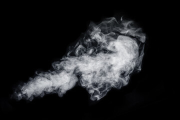 Diagonal mystical curly white vapor or smoke isolated on black background. Abstract fog or smog background
