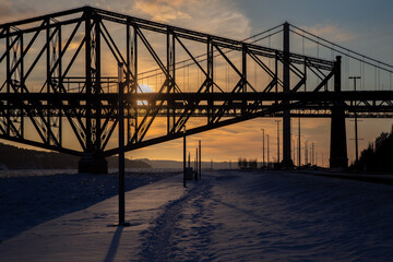 Quebec bridge at sun set in winter time